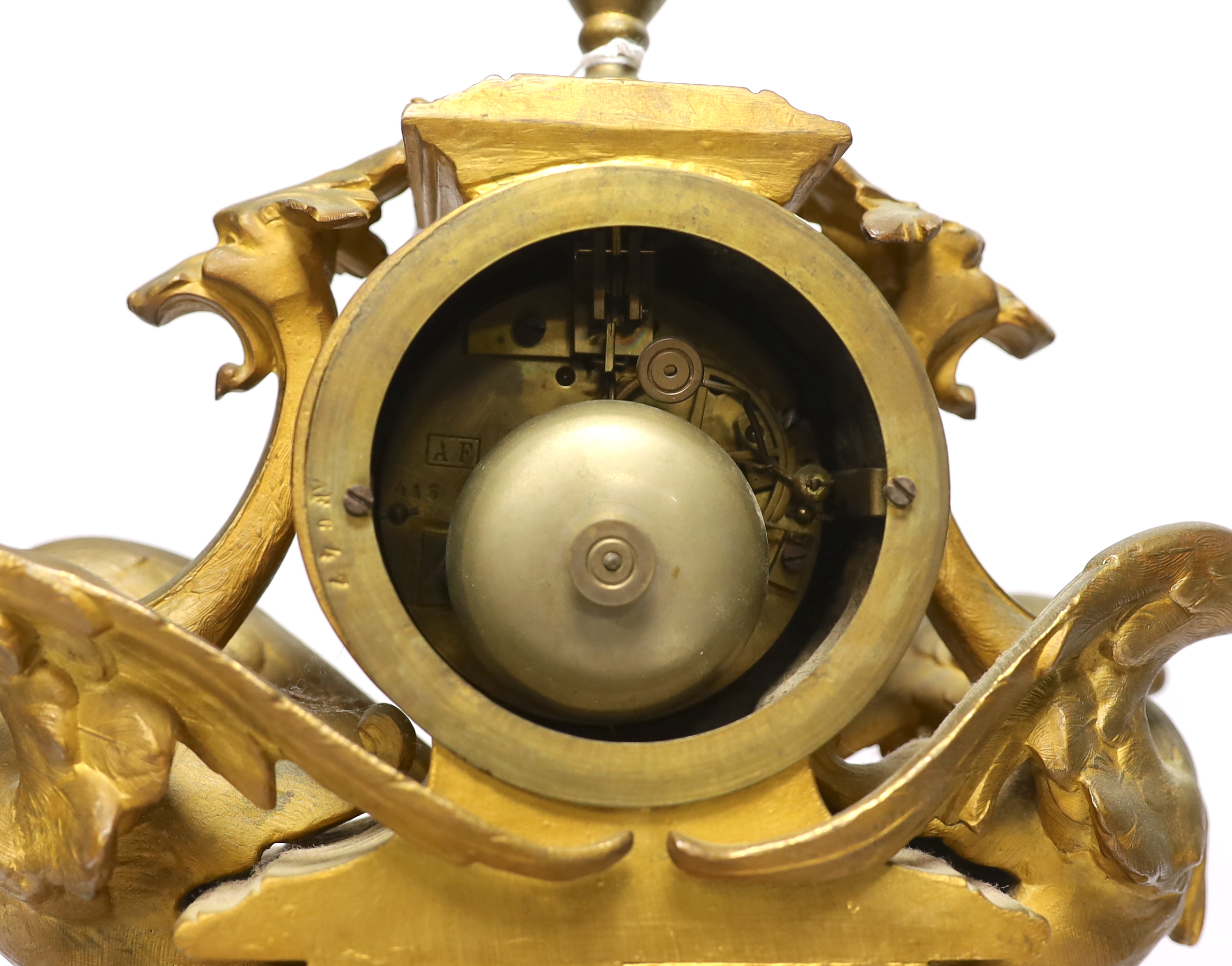 A Victorian gilt painted spelter mantel clock garniture, (dome missing) clock 43cm high